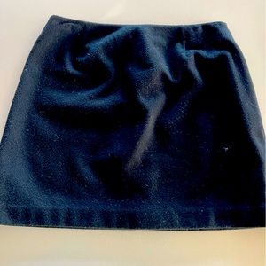 JCREW Skirt, 60%wool 26%nylon, 8% cashmere. front zip hits above the knee.